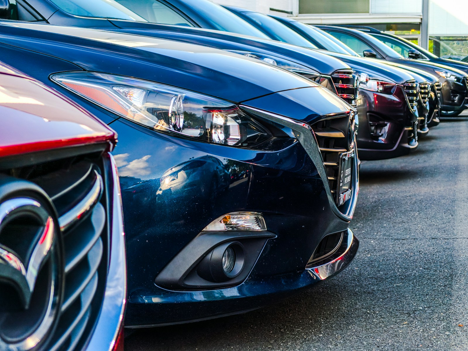 Classic cars lined up at a collector auction